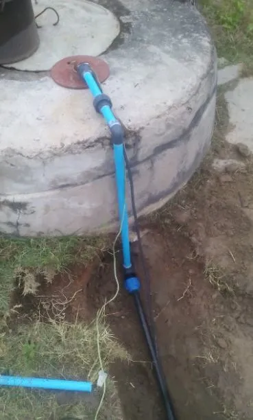 Submersible pump installed in a well